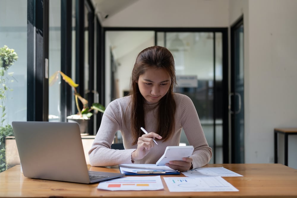woman researching on computer