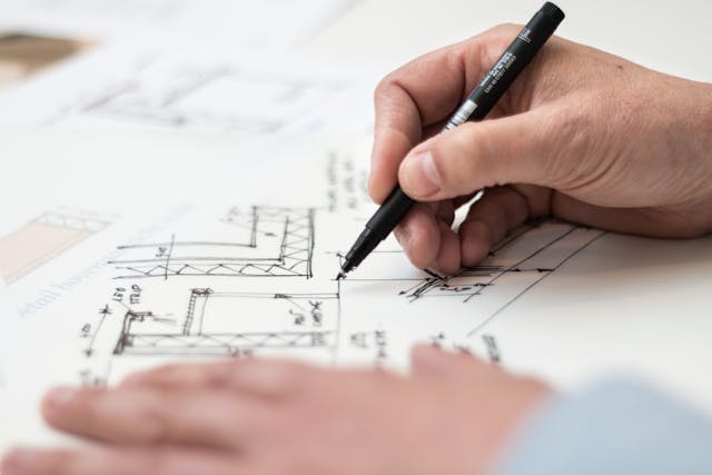 architect drawing plans